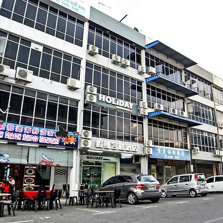 Oyo 44054 Holiday Mansion Inn Сибу Экстерьер фото