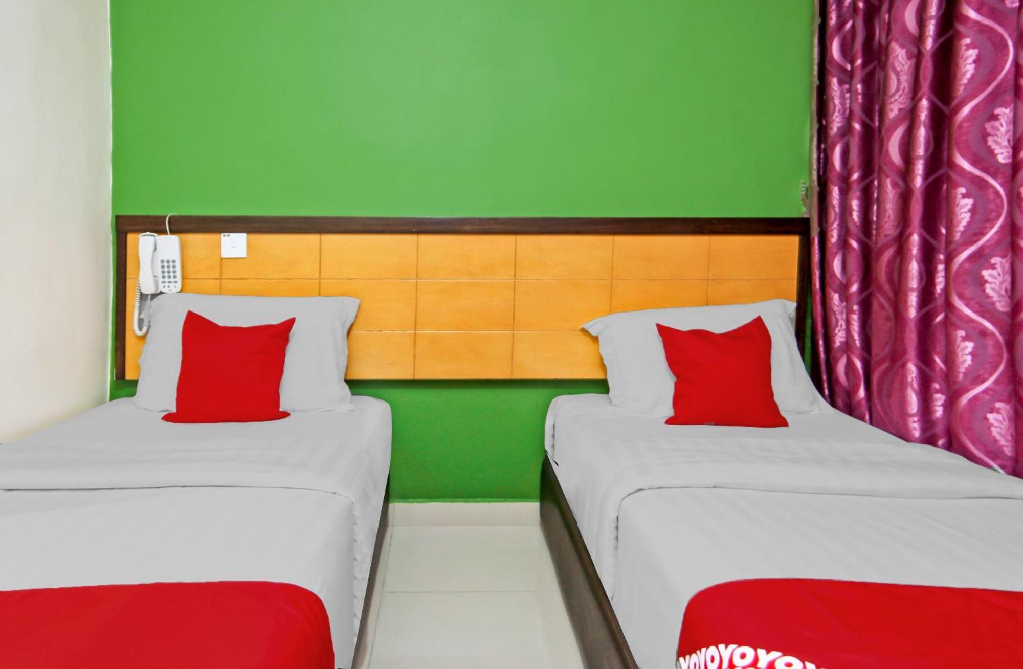 Oyo 44054 Holiday Mansion Inn Сибу Экстерьер фото