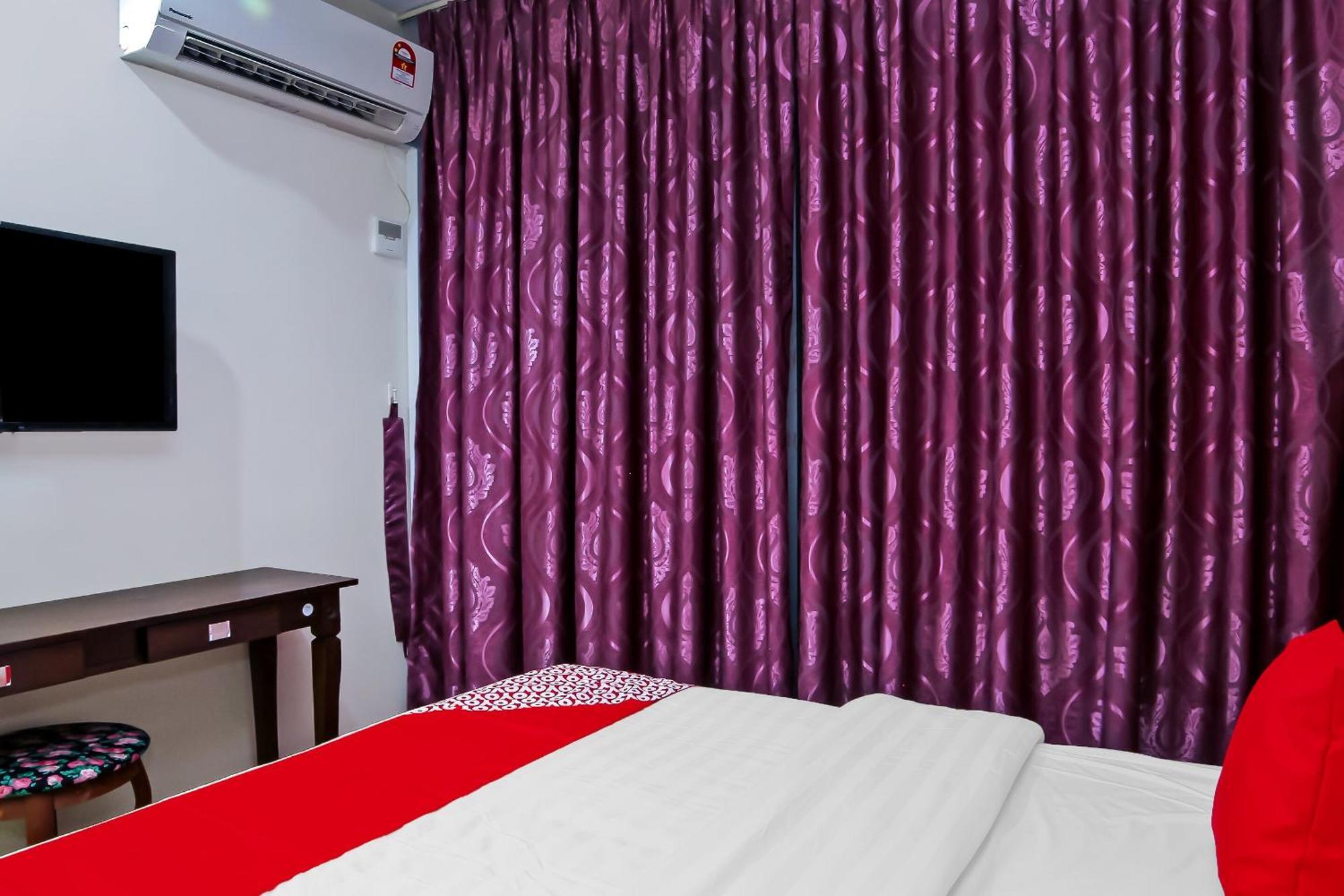 Oyo 44054 Holiday Mansion Inn Сибу Экстерьер фото