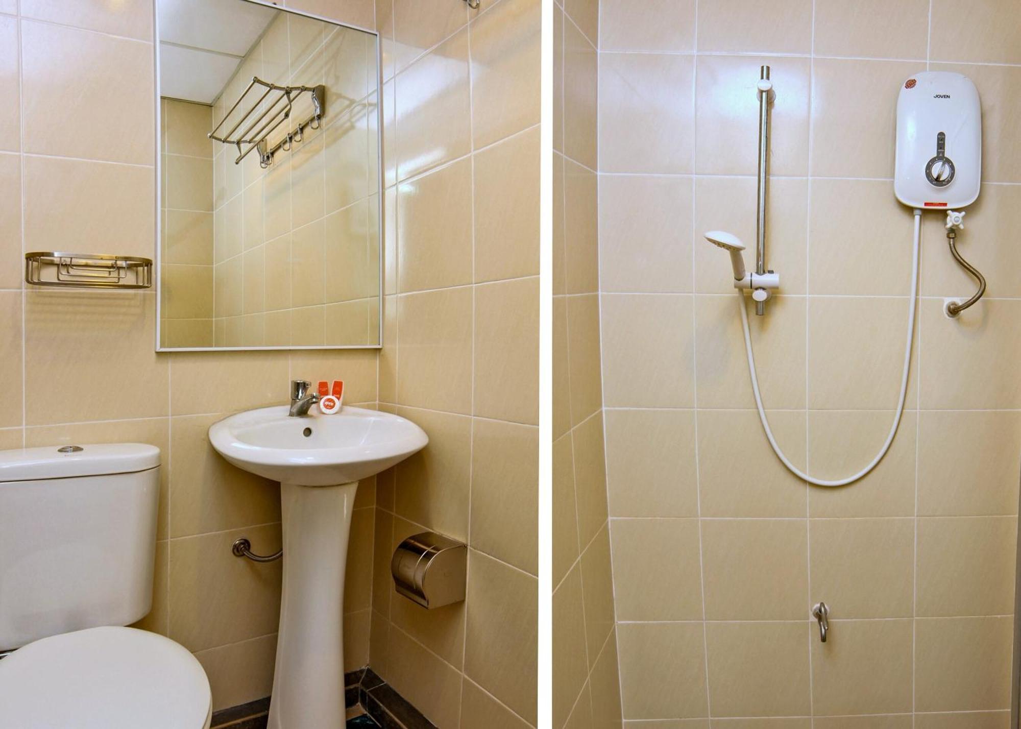 Oyo 44054 Holiday Mansion Inn Сибу Экстерьер фото