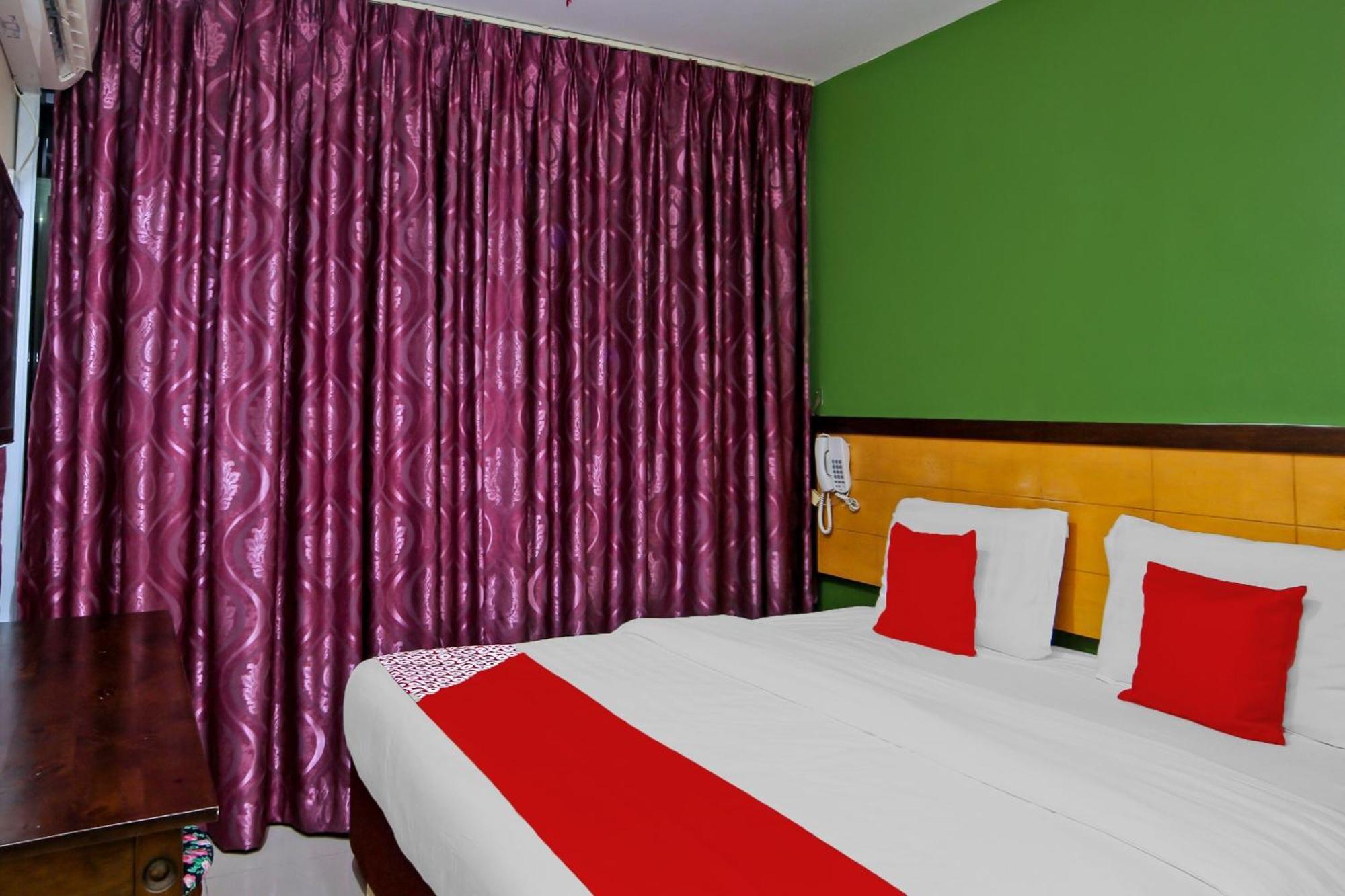 Oyo 44054 Holiday Mansion Inn Сибу Экстерьер фото