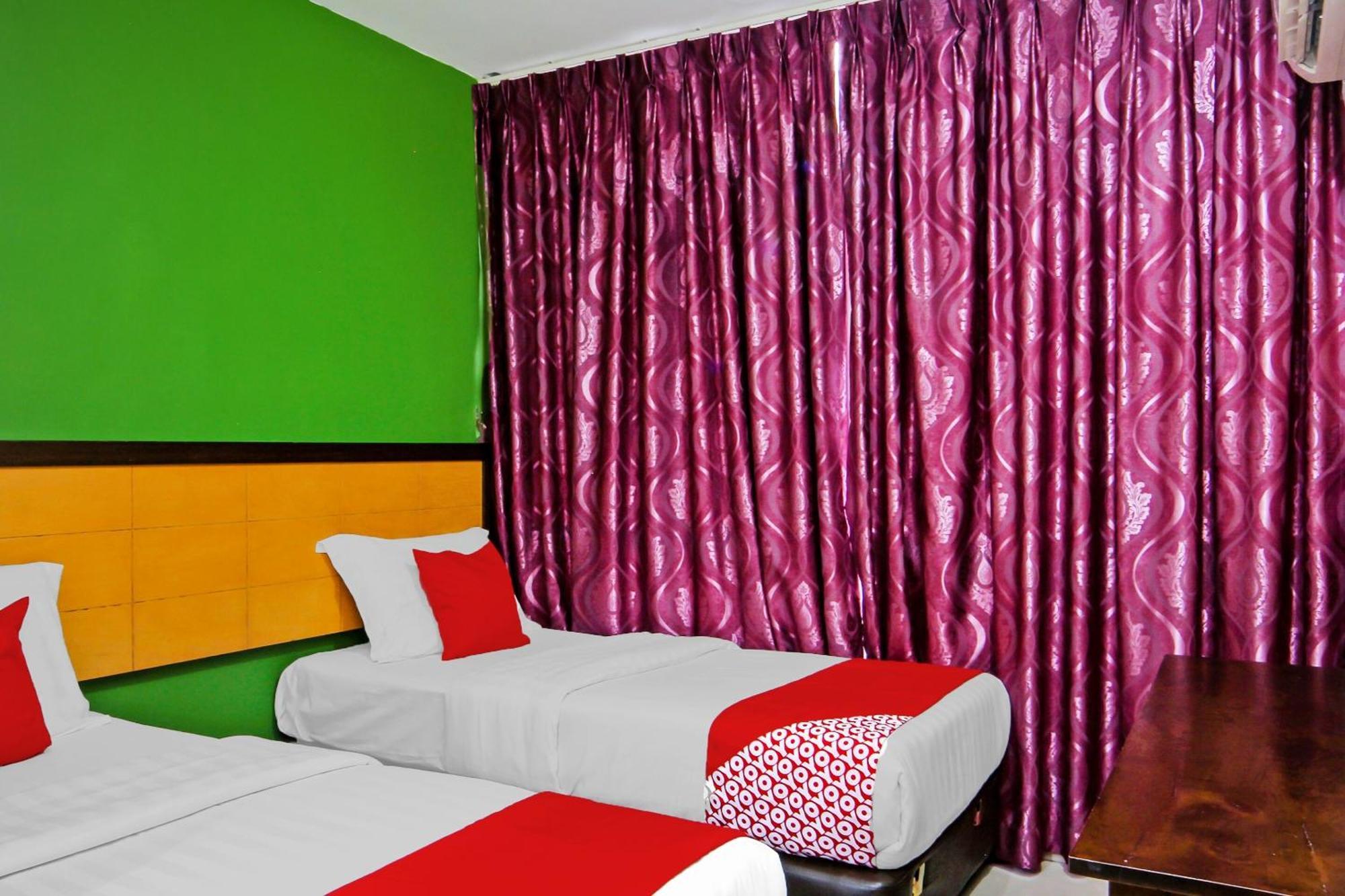 Oyo 44054 Holiday Mansion Inn Сибу Экстерьер фото